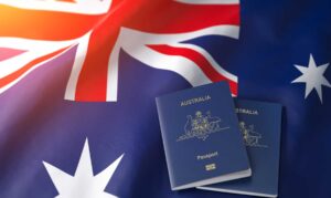 australian passport in front of the flag